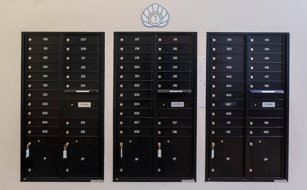 Mailboxes at The Pearl Apartments in Minneapolis, MN. Secure and organized parcel delivery system.