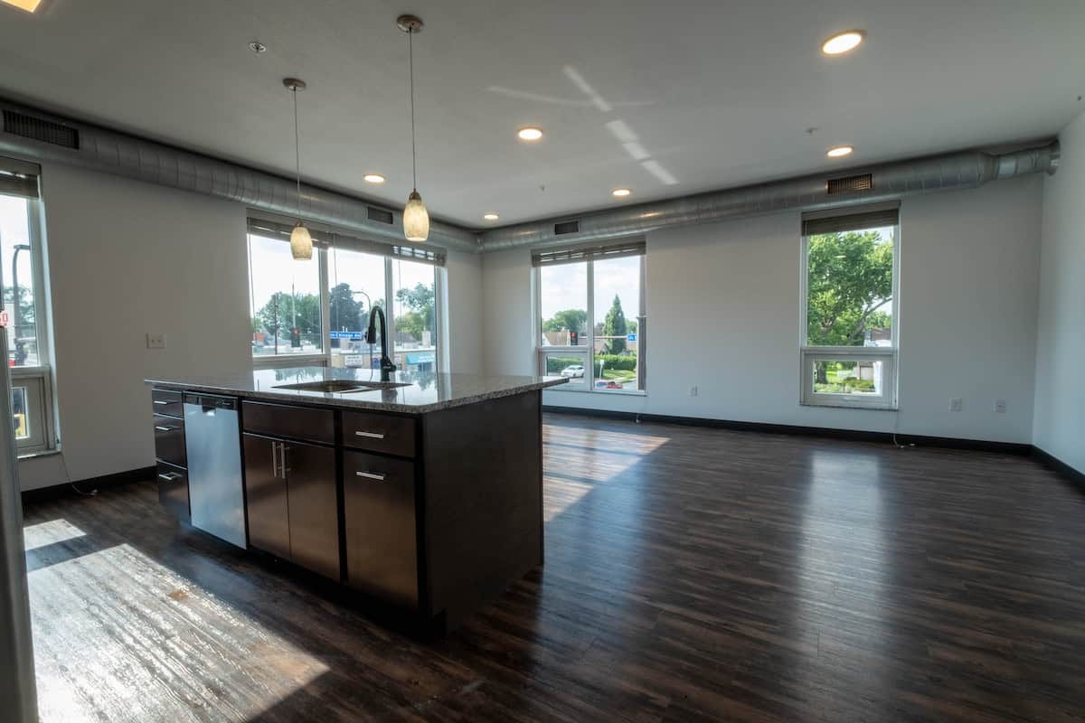 Bright, spacious apartment with large windows and hardwood floors in Minneapolis, MN.